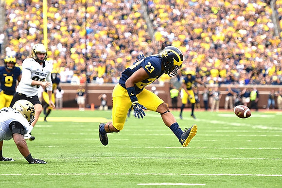Grant Perry (9) and Tyree Kinnel (23)