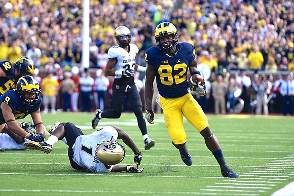 Mason Cole (52), Grant Perry (9), and Amara Darboh (82)