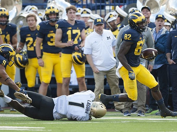 Grant Perry (9) and Amara Darboh (82)
