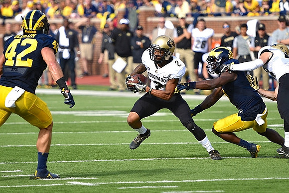 Ben Gedeon (42) and Jabrill Peppers (5)