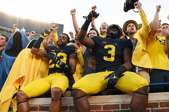 Tyree Kinnel (23) and Rashan Gary (3)