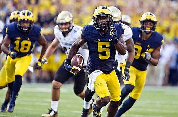 AJ Pearson (18), Jabrill Peppers (5), and Jeremy Clark (34)