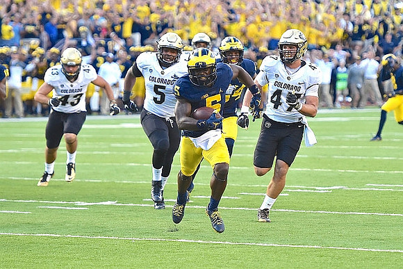Jabrill Peppers (5) and Jeremy Clark (34)