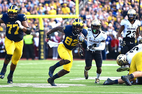 Grant Newsome (77) and Amara Darboh (82)