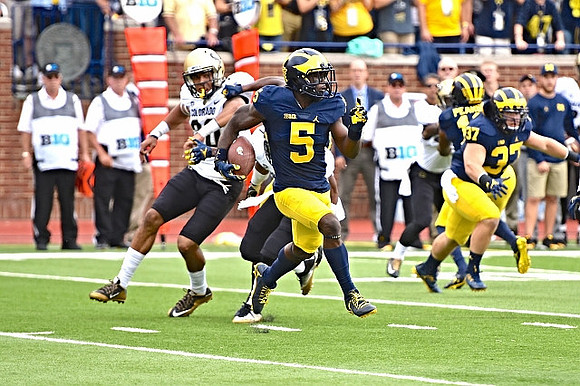 Jabrill Peppers (5) and Bobby Henderson (37)