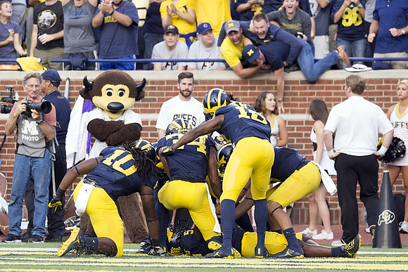 Devin Bush (10), Jeremy Clark (34), AJ Pearson (18), and Jabrill Peppers (5)