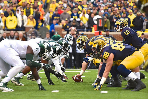 Jake Butt (88), Graham Glasgow (61), and Jake Rudock (15)