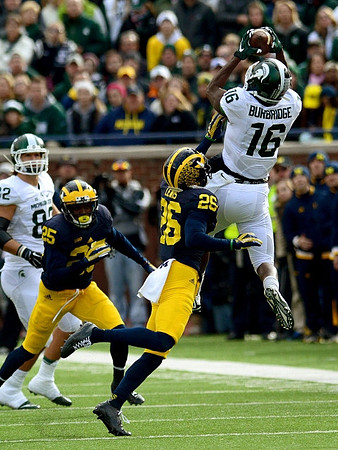 Dymonte Thomas (25) and Jourdan Lewis (26)