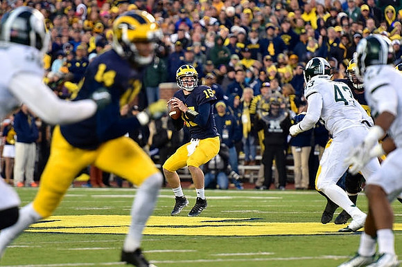 Drake Harris (14) and Jake Rudock (15)