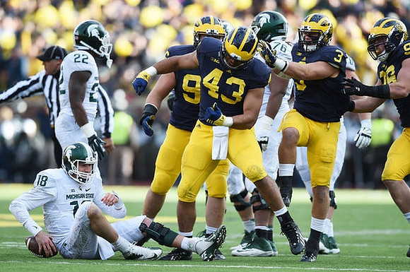 Ryan Glasgow (96), Chris Wormley (43), Desmond Morgan (3), and Matthew Godin (99)