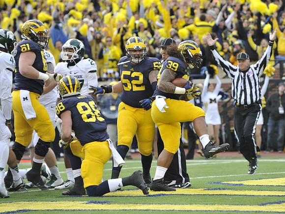 Graham Glasgow (61), Jake Butt (88), Mason Cole (52), and Sione Houma (39)