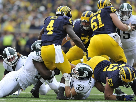 De'Veon Smith (4), Ben Braden (71), Mason Cole (52), and Graham Glasgow (61)