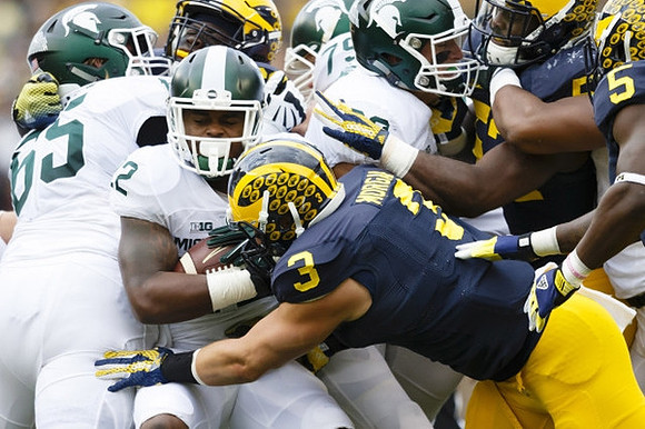 Desmond Morgan (3) and Jabrill Peppers (5)