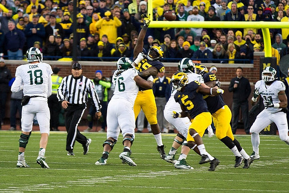 Willie Henry (69), Jabrill Peppers (5), and Royce Jenkins-Stone (52)