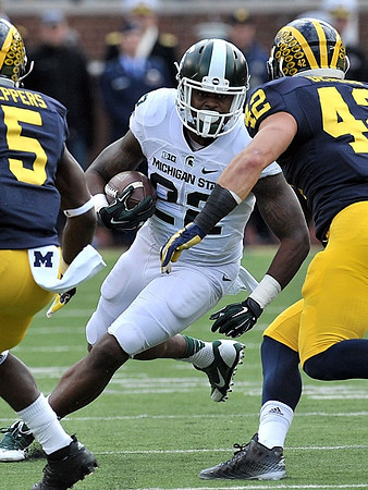 Jabrill Peppers (5) and Ben Gedeon (42)