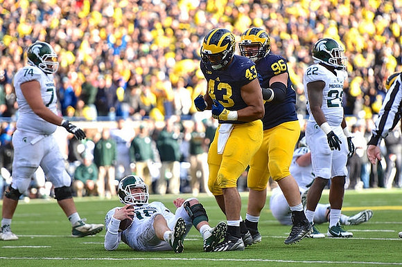 Chris Wormley (43) and Ryan Glasgow (96)