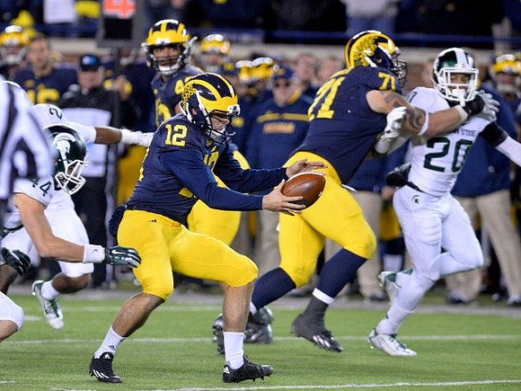 Blake O'Neill (12), Ben Braden (71), and Chris Wormley (43)