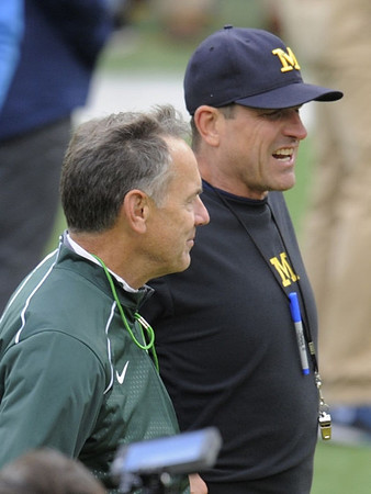 Michigan State Head Coach Mark Dantonio and Jim Harbaugh