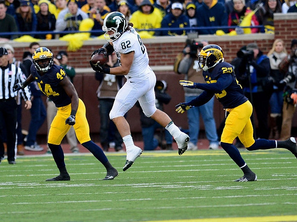 Delano Hill (44) and Dymonte Thomas (25)