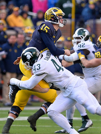 Jake Rudock (15) and Erik Magnuson (78)