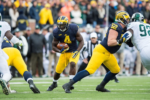 De'Veon Smith (4) and Mason Cole (52)