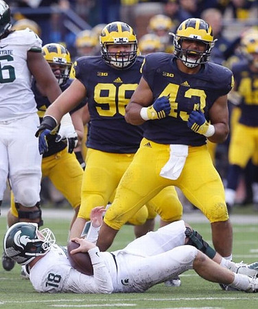Ryan Glasgow (96) and Chris Wormley (43)