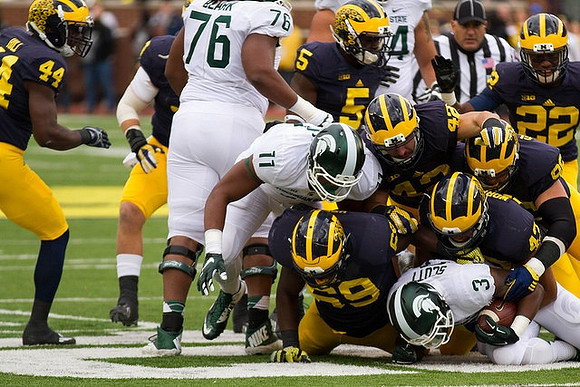Delano Hill (44), Willie Henry (69), Jabrill Peppers (5), Ben Gedeon (42), Ryan Glasgow (96), and Jarrod Wilson (22)