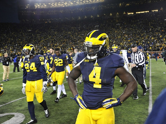 Wayne Lyons (24), Amara Darboh (82), and De'Veon Smith (4)