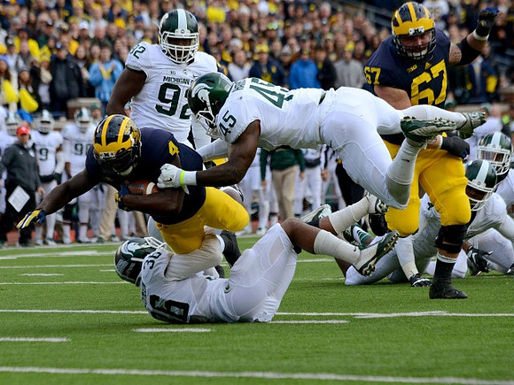 De'Veon Smith (4) and Kyle Kalis (67)