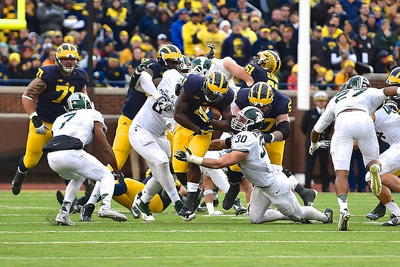 Ben Braden (71), De'Veon Smith (4), Kyle Kalis (67), and Graham Glasgow (61)