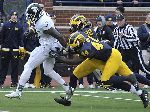 Delano Hill (44) and Jarrod Wilson (22)