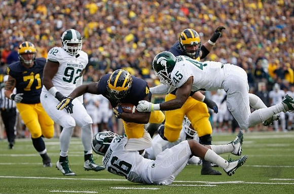 Ben Braden (71), De'Veon Smith (4), and Kyle Kalis (67)