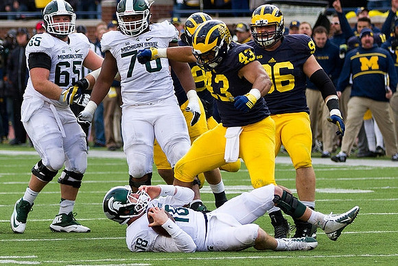 Chris Wormley (43) and Ryan Glasgow (96)
