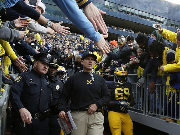 Jim Harbaugh and Willie Henry (69)