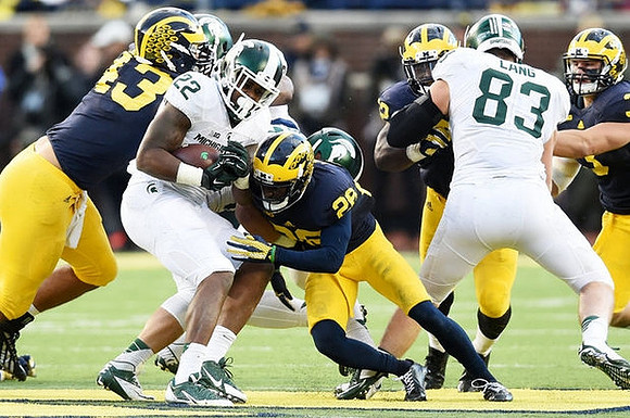 Chris Wormley (43), Jourdan Lewis (26), Royce Jenkins-Stone (52), and Desmond Morgan (3)
