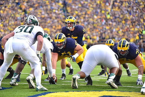 Graham Glasgow (61), Jake Rudock (15), and Ben Braden (71)