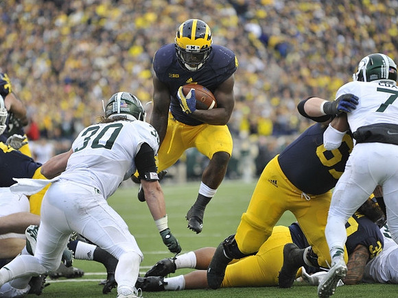 De'Veon Smith (4), Kyle Kalis (67), and Sione Houma (39)