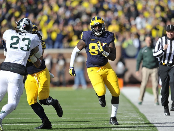 A.J. Williams (84) and Drake Johnson (20)