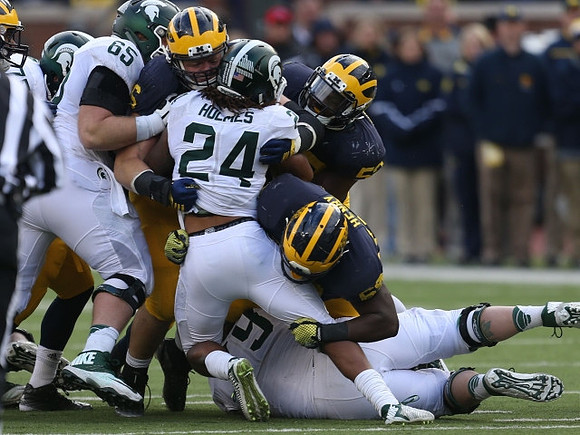Ryan Glasgow (96), Royce Jenkins-Stone (52), and Willie Henry (69)