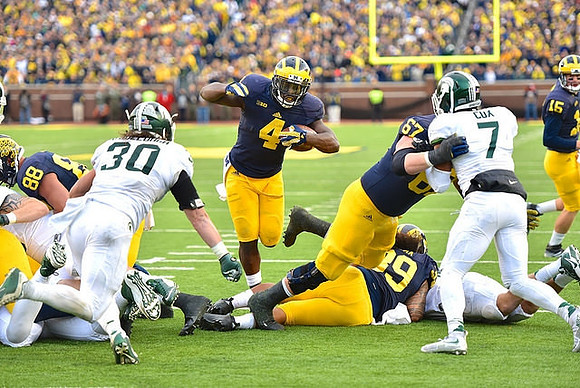 Jake Butt (88), De'Veon Smith (4), Sione Houma (39), Jake Rudock (15), and Kyle Kalis (67)