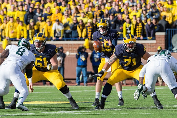 Graham Glasgow (61), Jake Rudock (15), and Ben Braden (71)