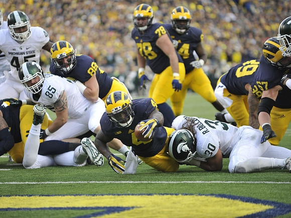 Jake Butt (88), De'Veon Smith (4), Erik Magnuson (78), A.J. Williams (84), Sione Houma (39), and Kyle Kalis (67)
