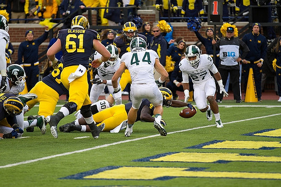 Kyle Kalis (67), Graham Glasgow (61), and De'Veon Smith (4)
