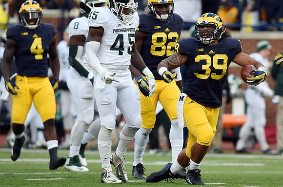 Jabrill Peppers (5), Amara Darboh (82), and Sione Houma (39)