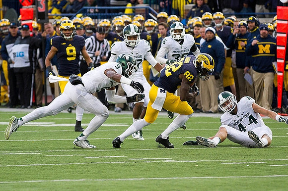 Grant Perry (9) and Amara Darboh (82)