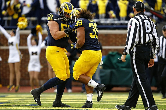 Mason Cole (52) and Sione Houma (39)