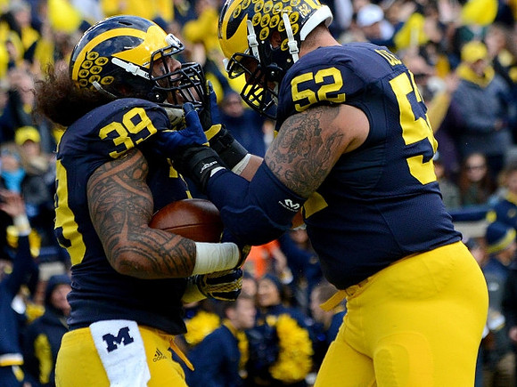 Sione Houma (39) and Mason Cole (52)