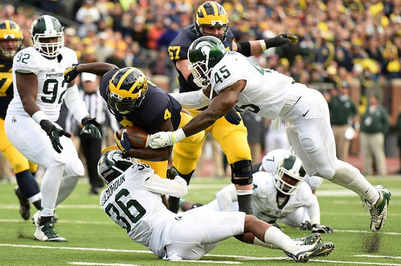 De'Veon Smith (4) and Kyle Kalis (67)