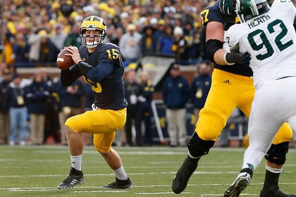 Jake Rudock (15) and Kyle Kalis (67)