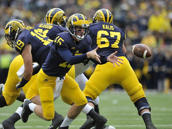 Henry Poggi (19), Graham Glasgow (61), Jake Rudock (15), and Kyle Kalis (67)
